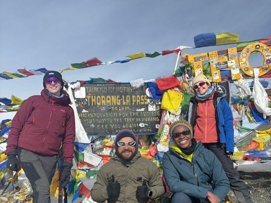 Trekkers at Thorong La Pass, Annapurna Circuit Trek in Nepal